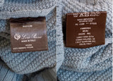 $9,050  Tunari Crew Neck 54 Vicuna